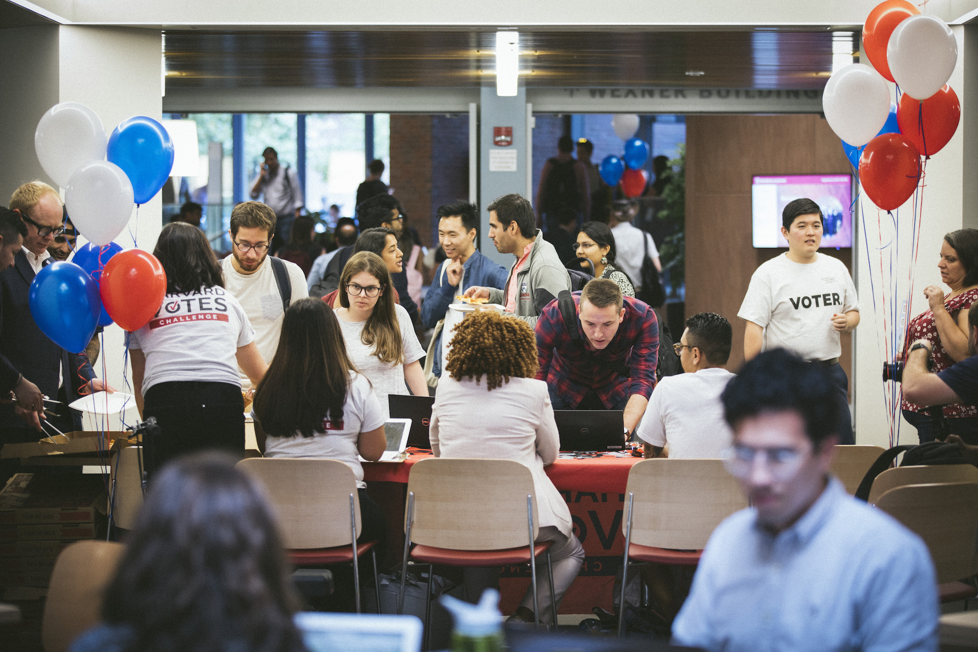 Students and staff work together to register new voters on the Kennedy School campus