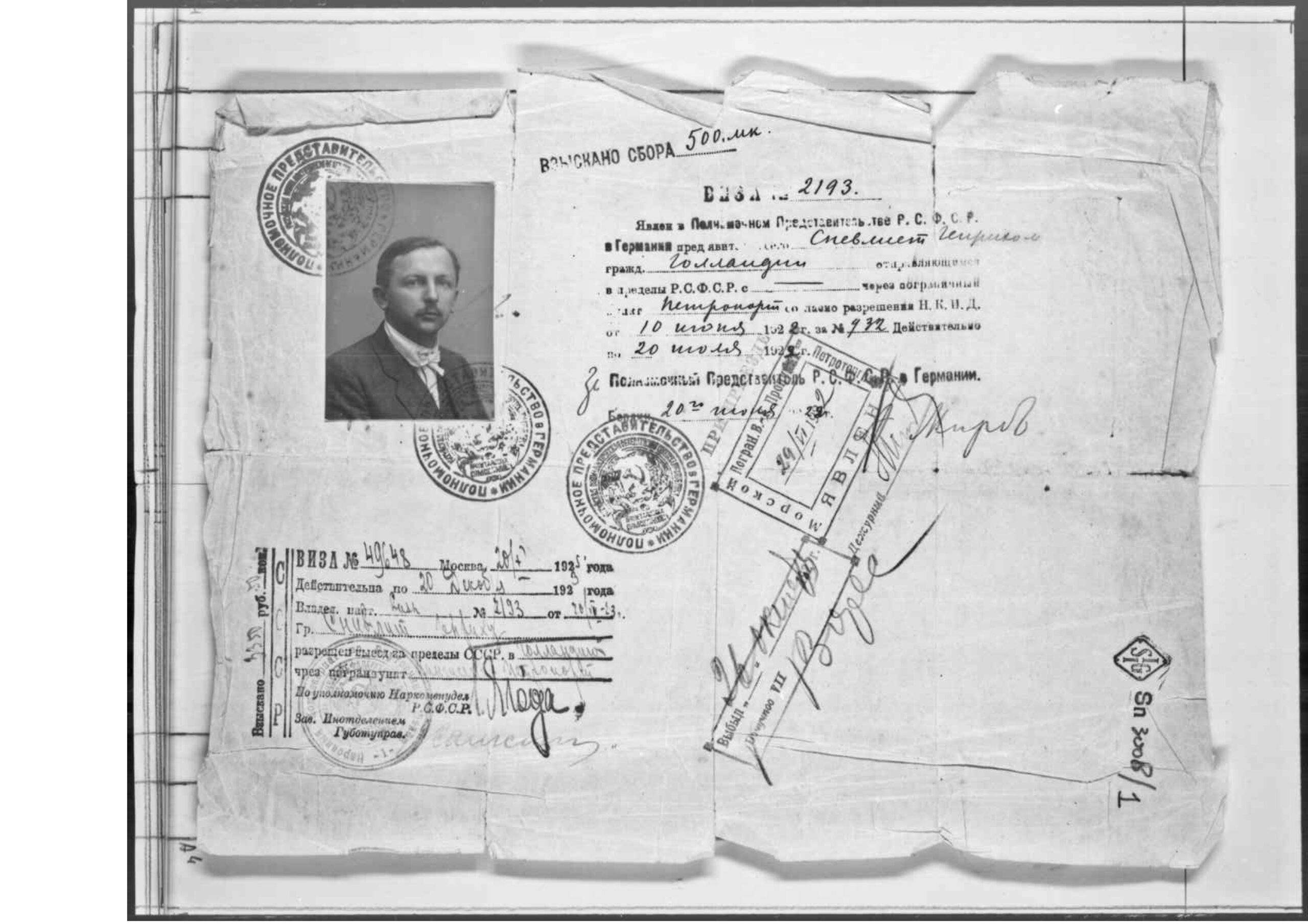 Scan of an old visa featuring a photo in the upper-left corner