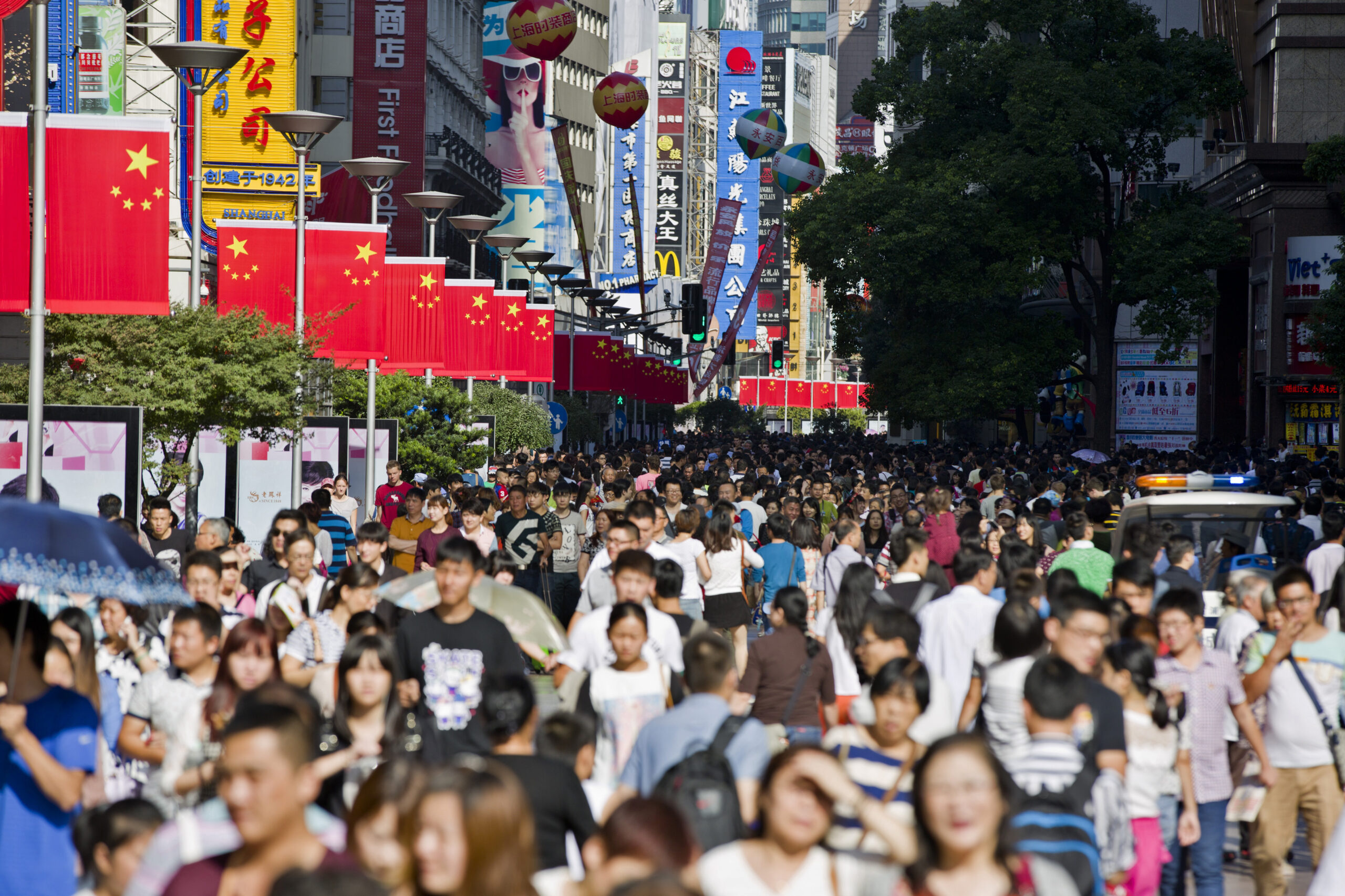 Nanjing Pedestrian Road, a main shopping area, packed with people on a national holiday in Shanghai in 2014