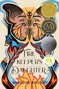 Cover of "The Fire Keepers Daughter" features two faces that make up the shape of a butterfly, underneath flames lick the words in the title. 