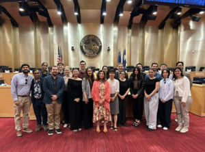 24 HKS students with Mayor Shelley Berkeley in Las Vegas City Hall during the 2025 Urban Rural Trek to the Southwest, co-led by Caren Yap.