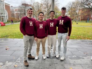 Cortez and friends at Harvard wearing matching H sweaters 