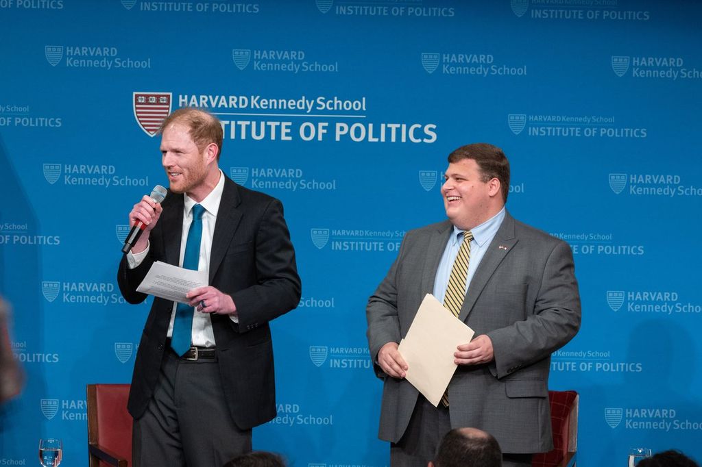 Ash Senior Fellow Stephen Richer introducing Vice President Pence alongside a Harvard undergraduate.