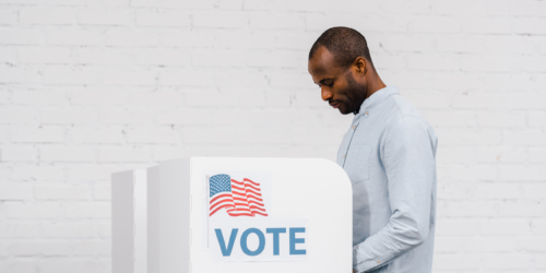 A man voting.