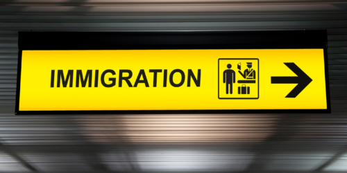 A photo of an immigration sign in an airport.