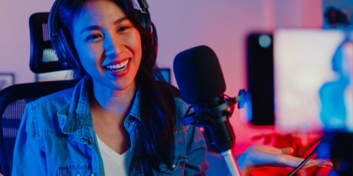A content creator with a microphone.