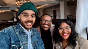 Board at the MLK Breakfast in Boston with Ash Center fellows Jonathan Jayes-Green and Christine Slaughter in January 2026. 