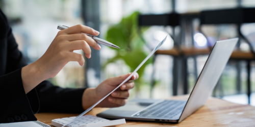 Person looking closely at a document