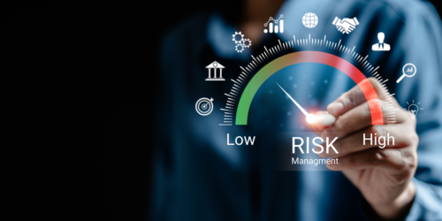 Person analyzing risk at a scale from low to high